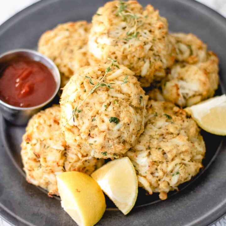 Famous food from Maryland, crab cakes, piled on a plate.