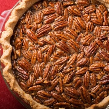 Pecan Pie with a red background.