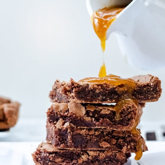 Stacked brownies with apricot glaze dripping down
