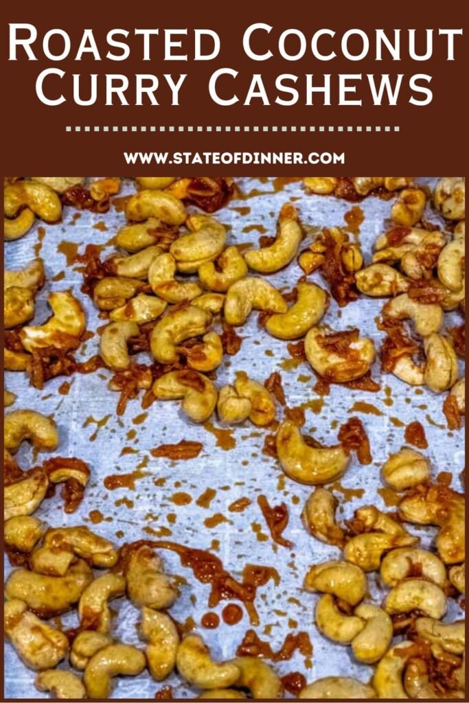 Cashews roasted with coconut and curry seasoning on a baking sheet. Text reads "Roasted Coconut Curry Cashews.
