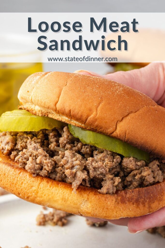 Pinterest pin that says "loose meat sandwich" and is a cloose up of a side view of someone holding the sandwich.