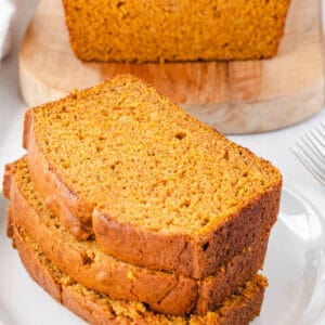 3 slices of pumpkin bread stacked.