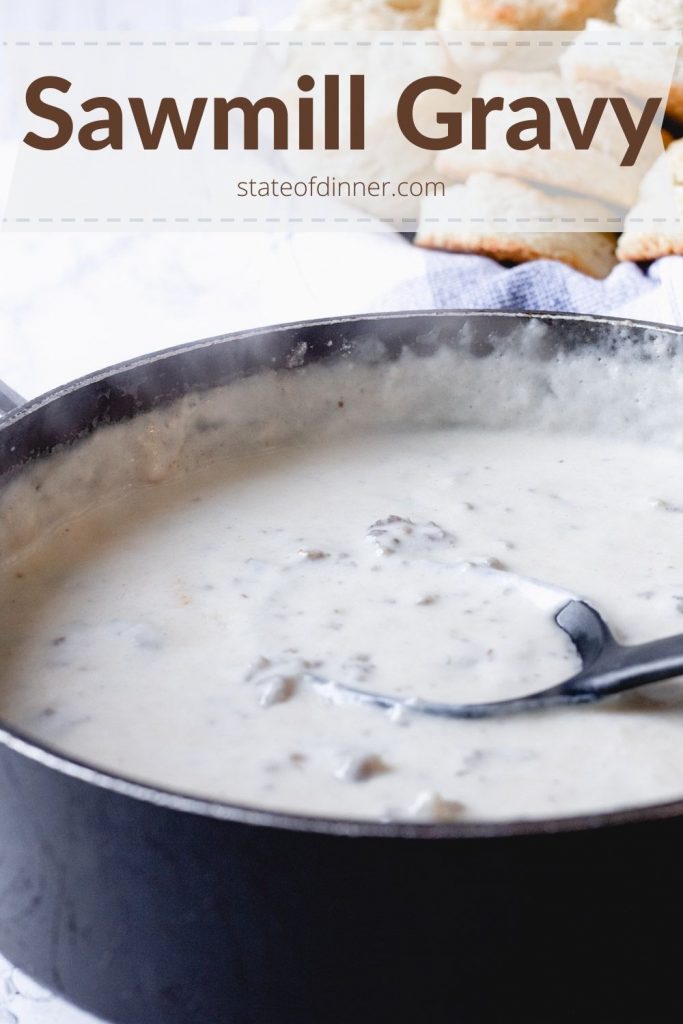 Pinterest Pin: Sawmill gravy in a pan with biscuits.