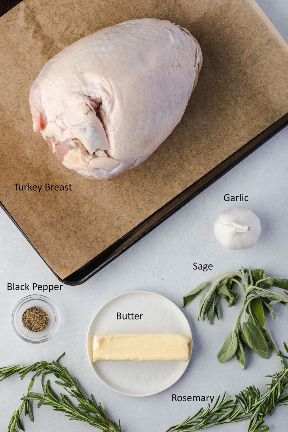 Overhead of labeled garlic herb butter turkey ingredients.
