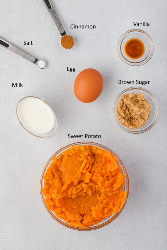 Labeled overhead of sweet potato casserole ingredients.