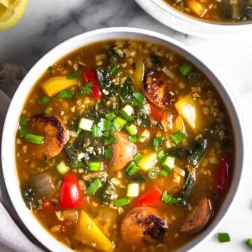 Bowl of sausage, pepper, and rice soup.