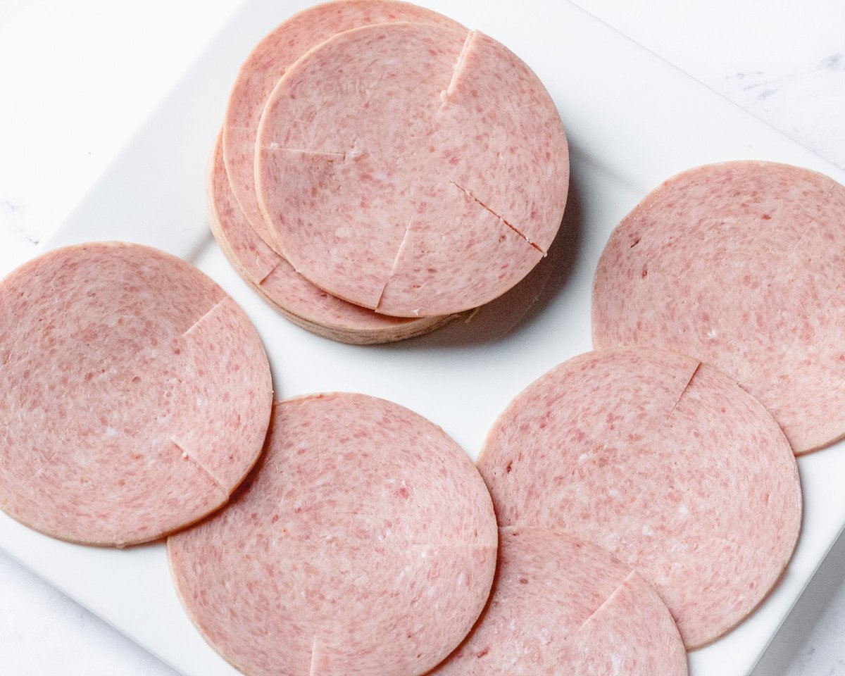 Plate of pork roll slices.