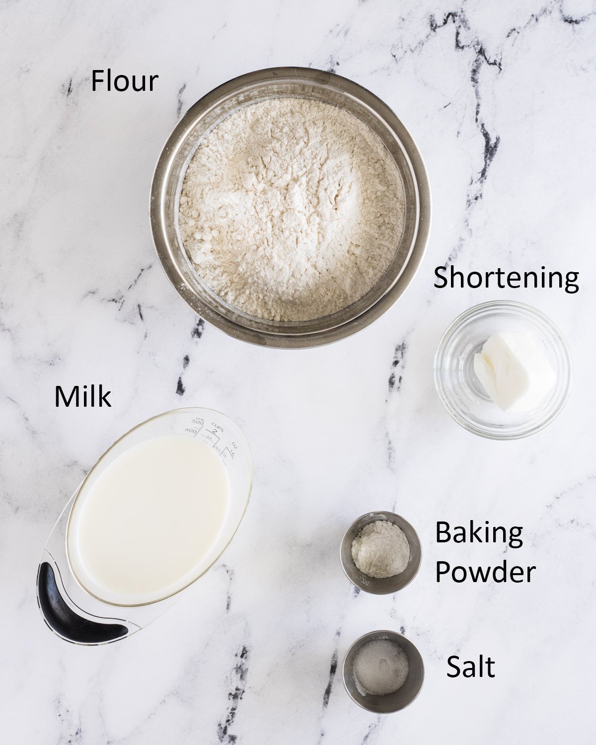 New Mexican Sopapilla ingredients: Flour, milk, shortening, baking powder, and salt.