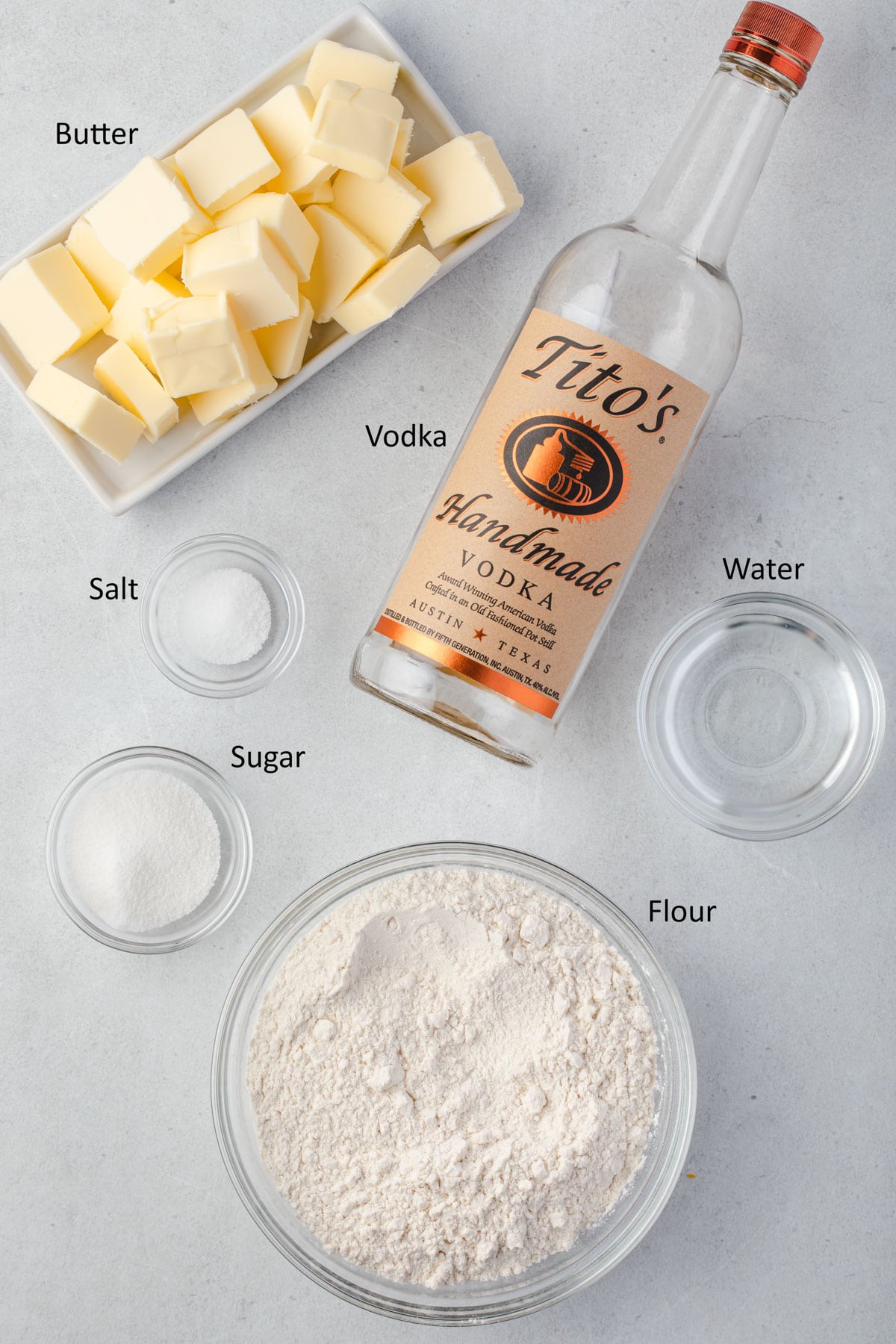 Labeled ingredients for butter vodka pie crust.
