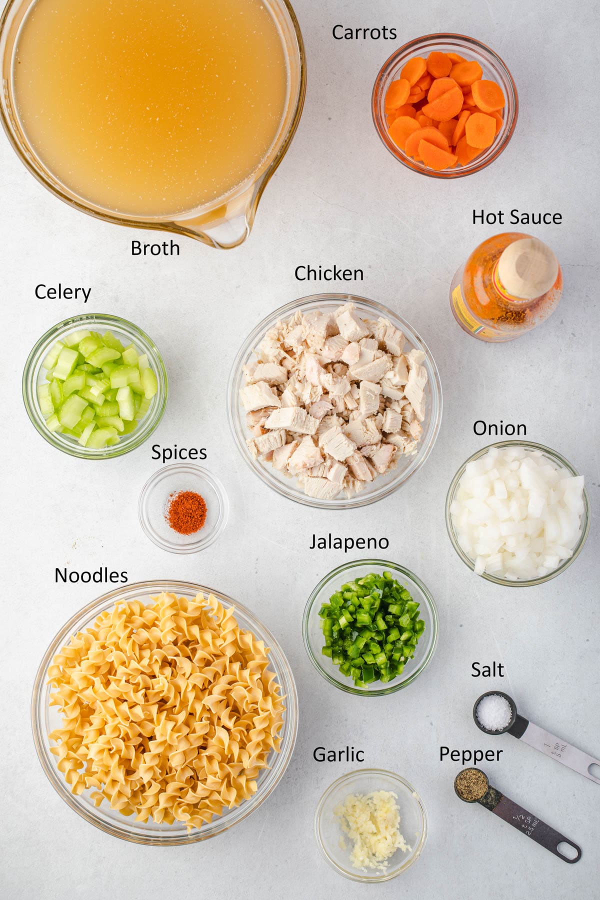 Labeled ingredients for spicy chicken noodle soup.