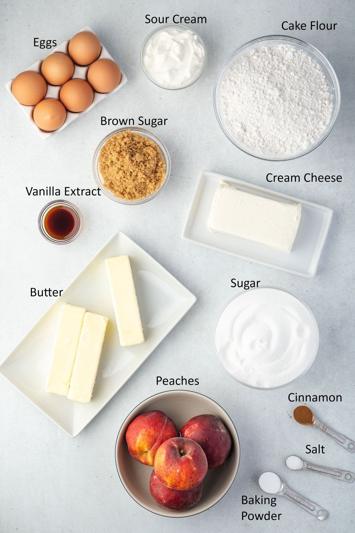 Overhead labeled cobbler pound cake ingredients.