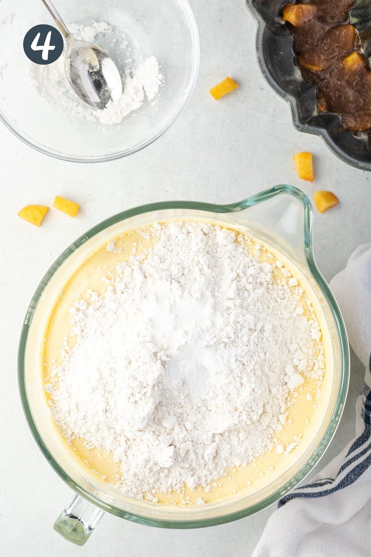 Flour on top of batter in large mixing bowl.