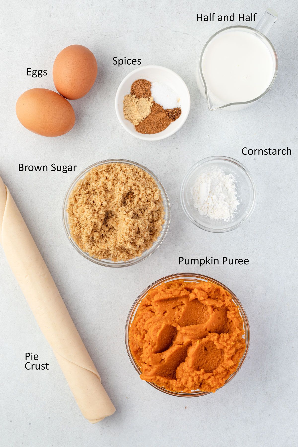 Overhead of ingredients for pumpkin pie with half and half instead of evaporated milk.