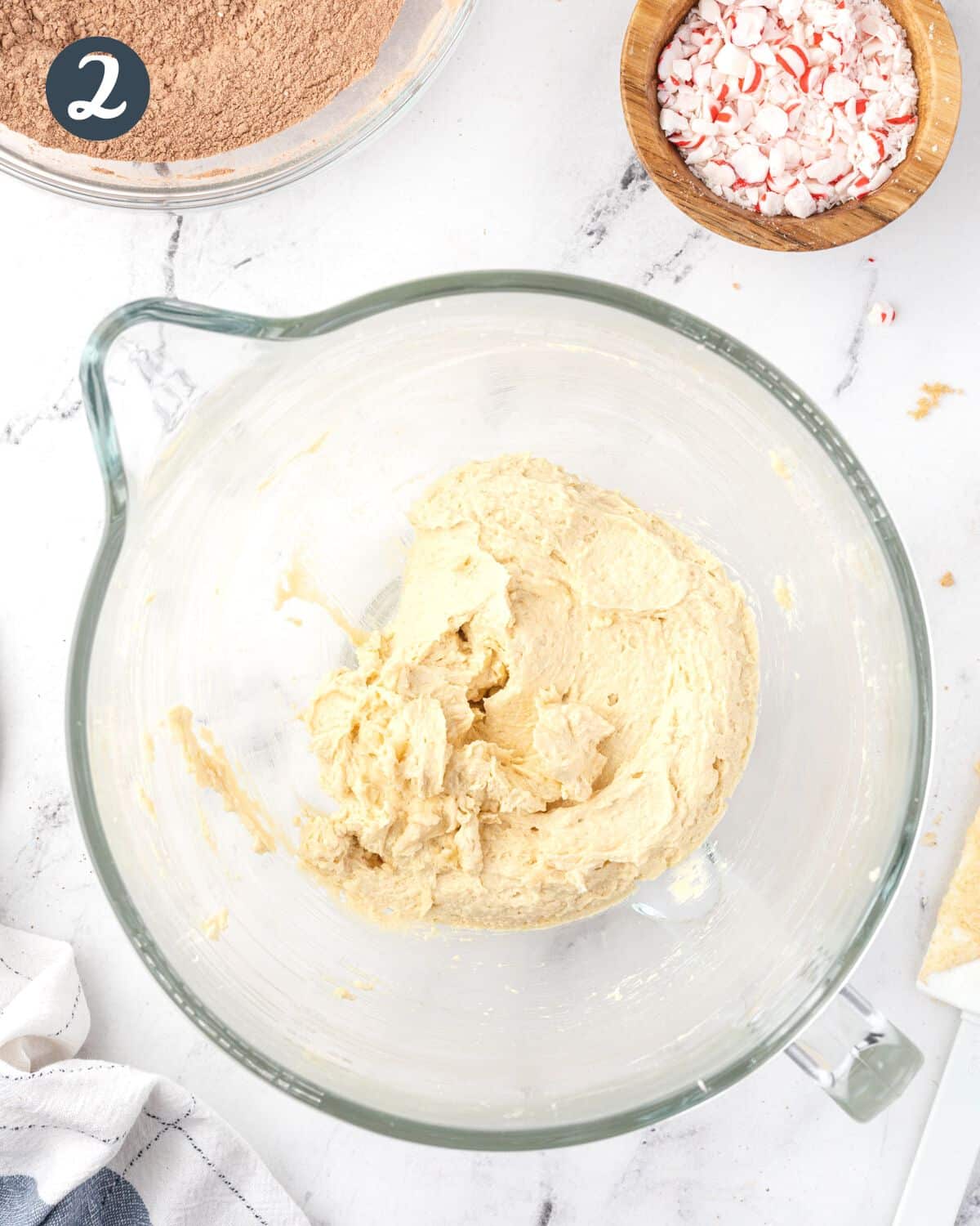Butter and sugar creamed and fluffy in a large mixing bowl.