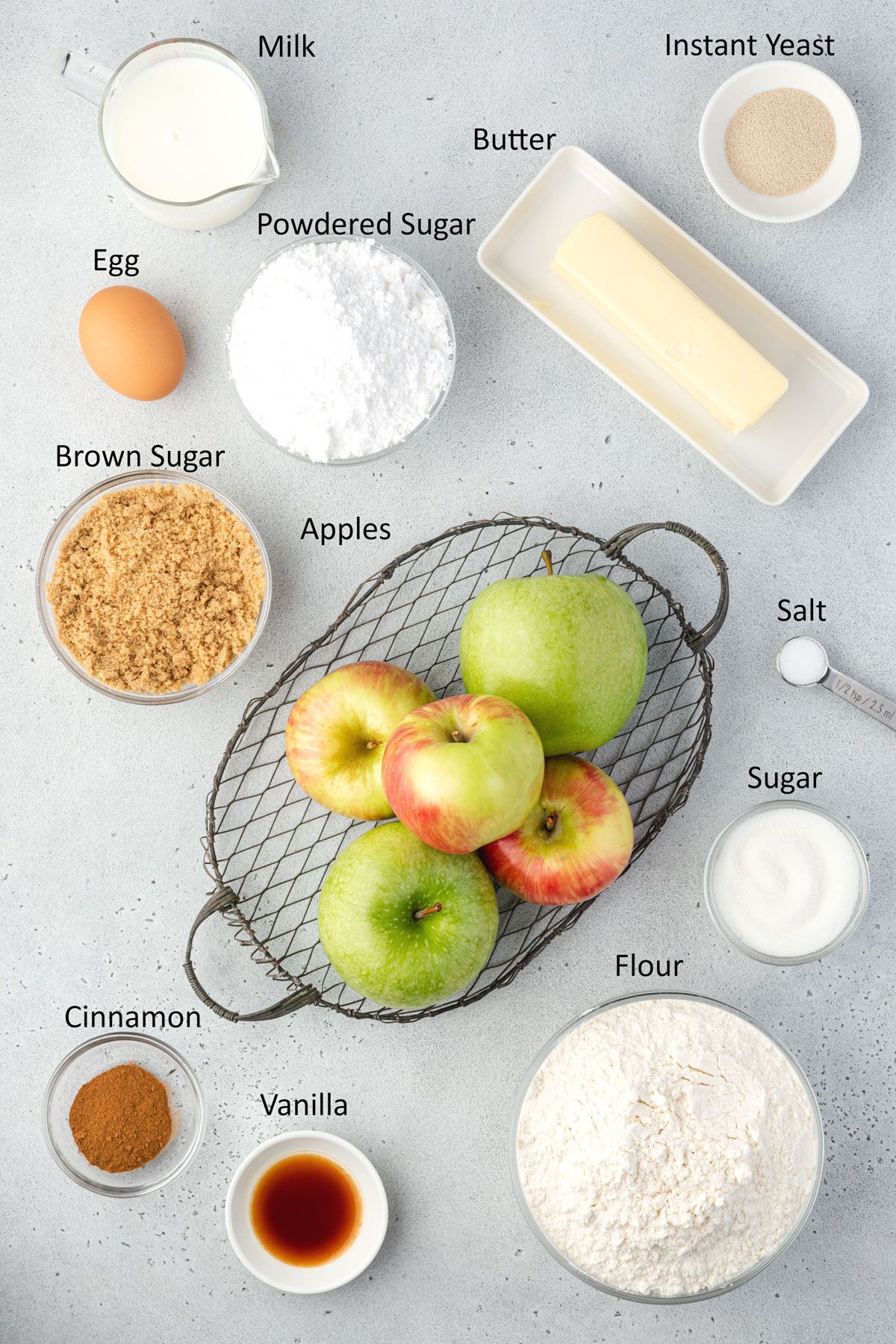 Overhead showing ingredients for cinnamon rolls with apple pie filling.