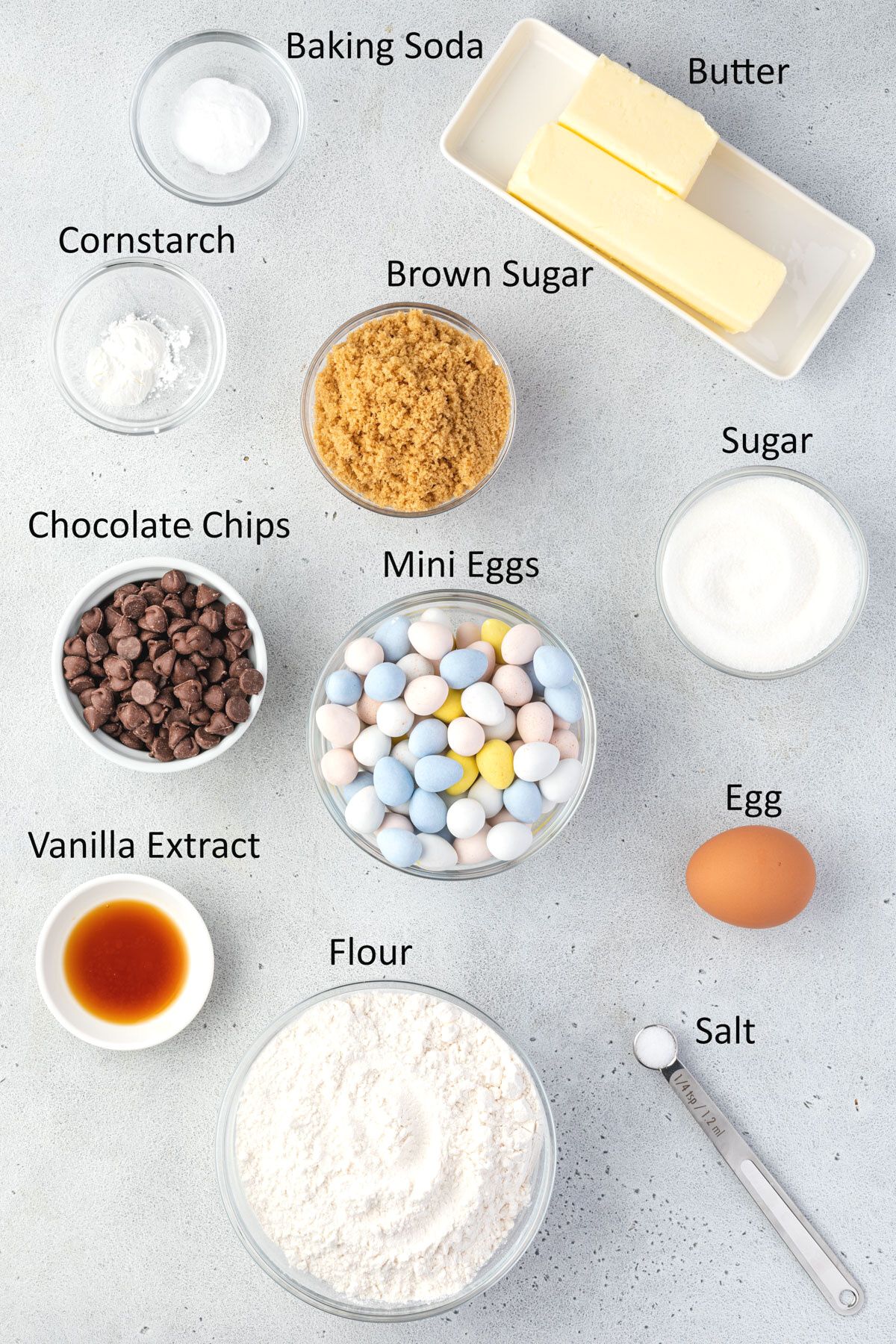 Overhead showing the individual ingredients for Cadbury Mini Egg Cookies.
