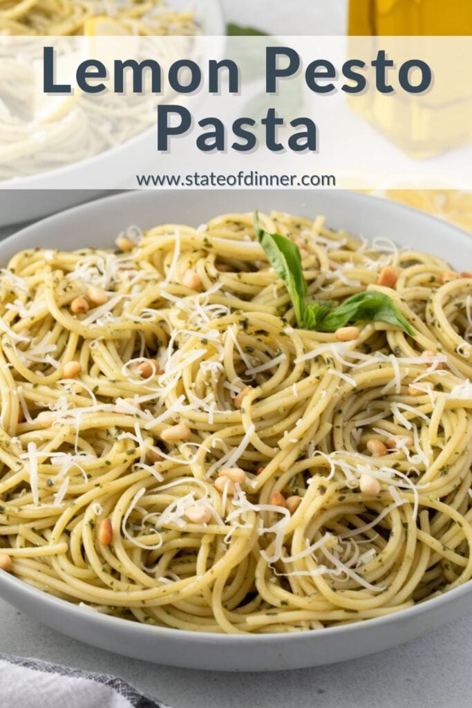 Pinterest pin that says "lemon pesto pasta" and has a big shallow grey bowl of pasta.