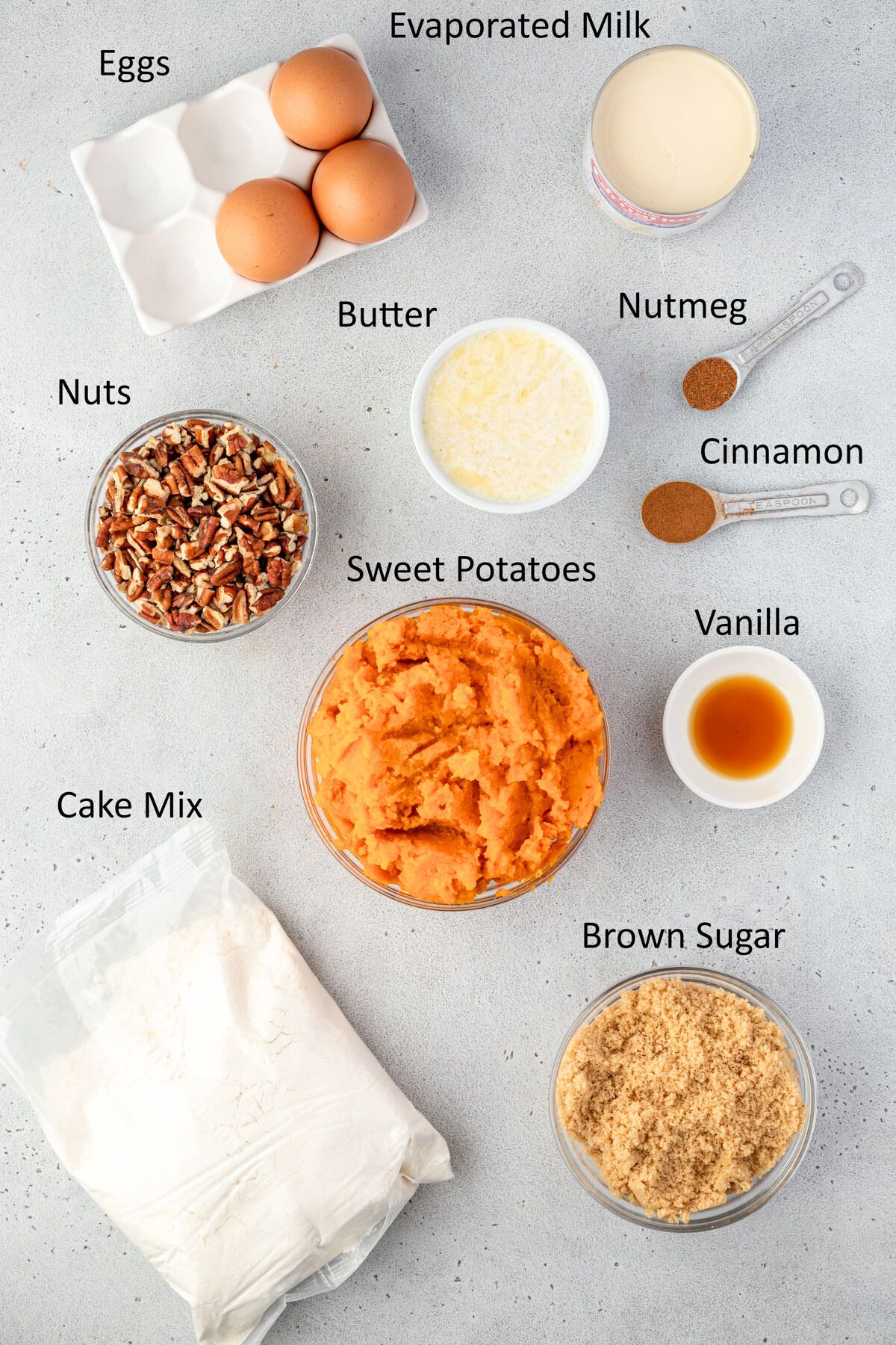 Overhead of the dump cake ingredients in individual bowls.
