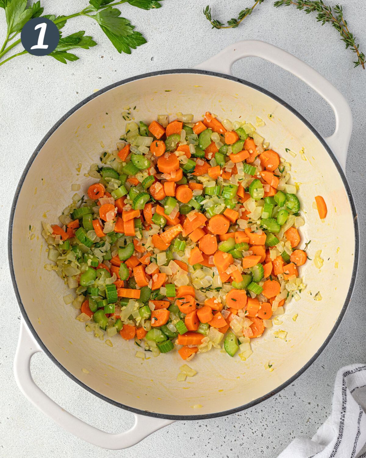 Mirepoux (chopped carrots, celery, and onions) in a dutch oven.