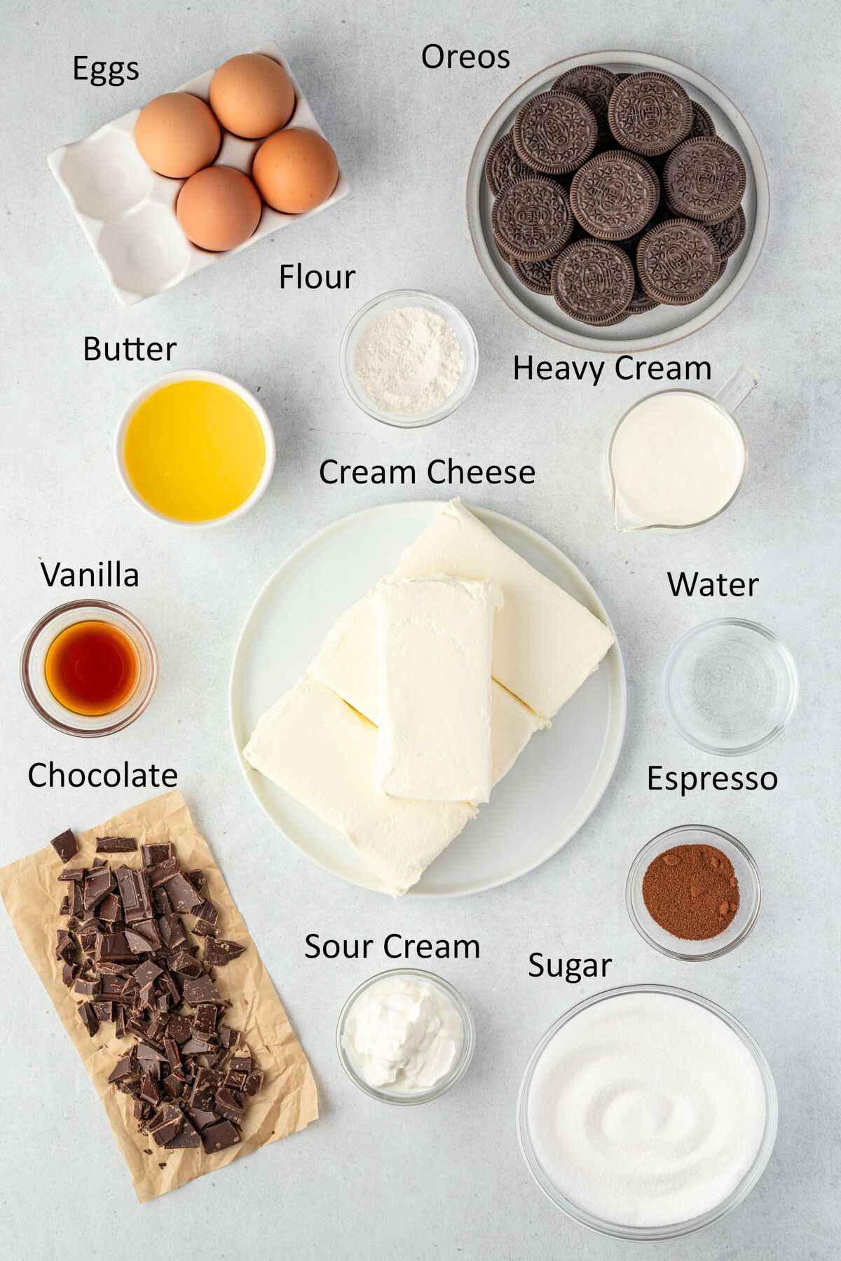 Cheesecake ingredients in individual bowls.