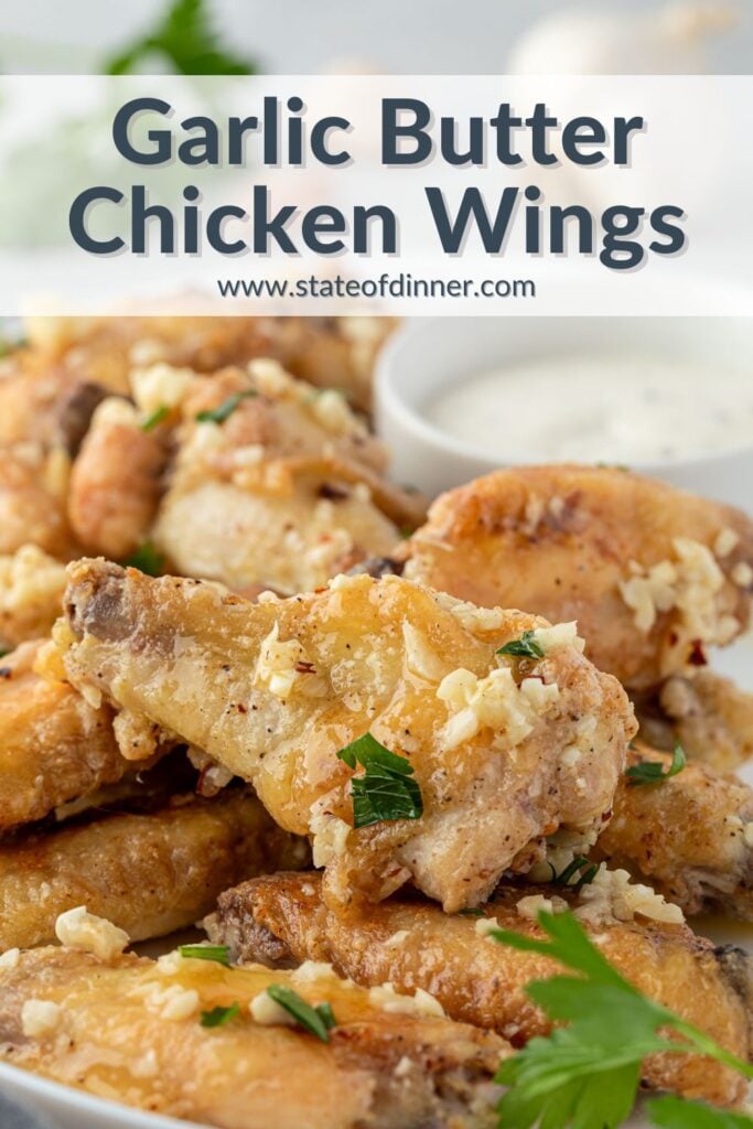 Pinterest pin that says "garlic butter chicken wings" and shows a platter of wings.