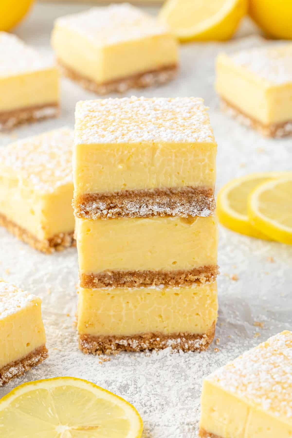 3 Lemon bars stacked on top of each other.