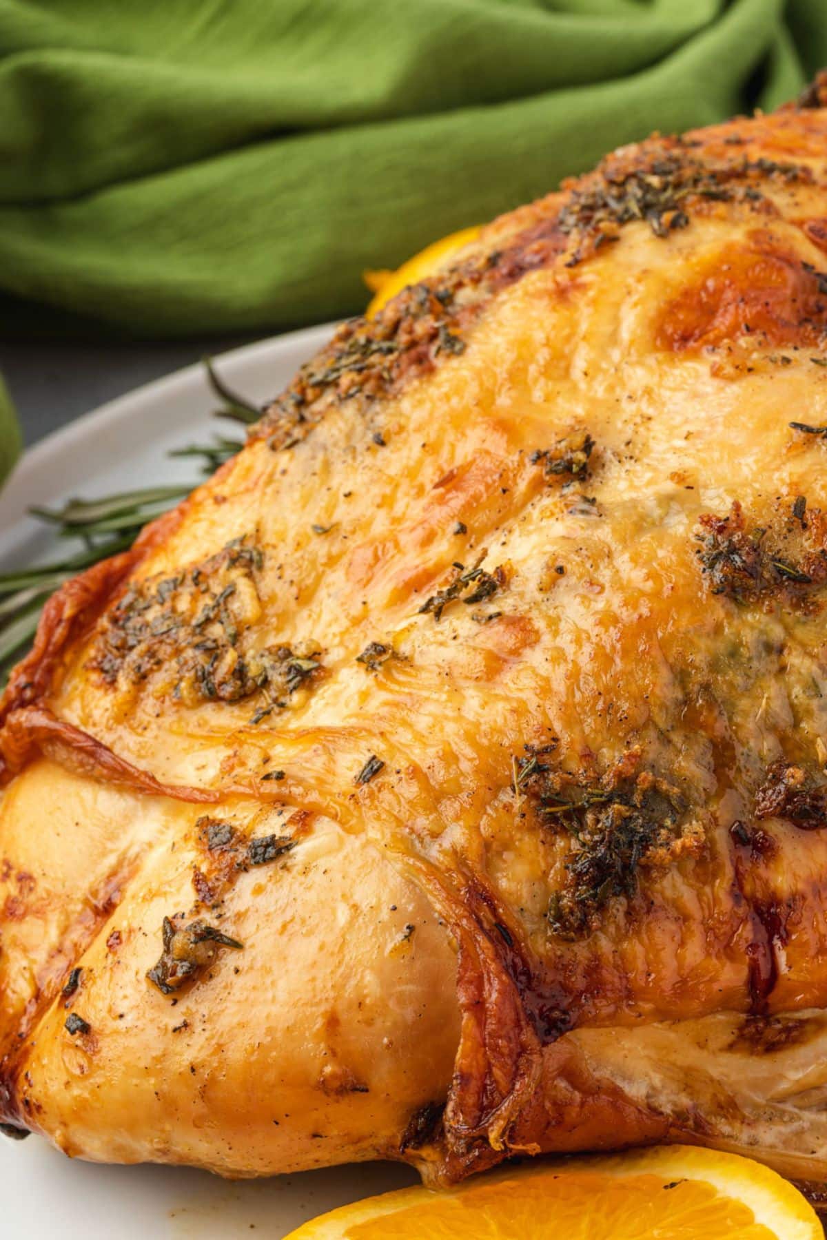 Close-up of a succulent, herb-seasoned roasted turkey.