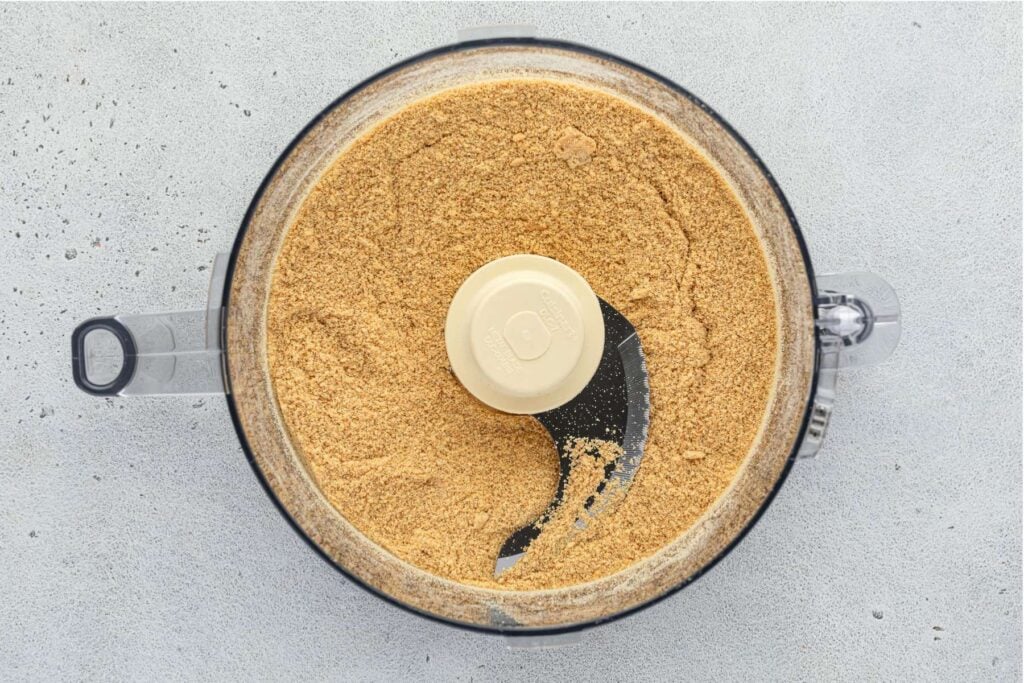 Finely ground graham crackers in a food processor.