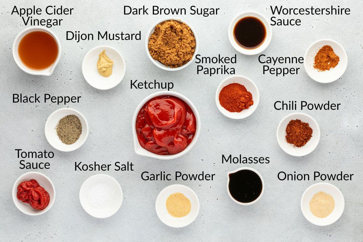 Ingredients for BBQ sauce in small bowls with labels.