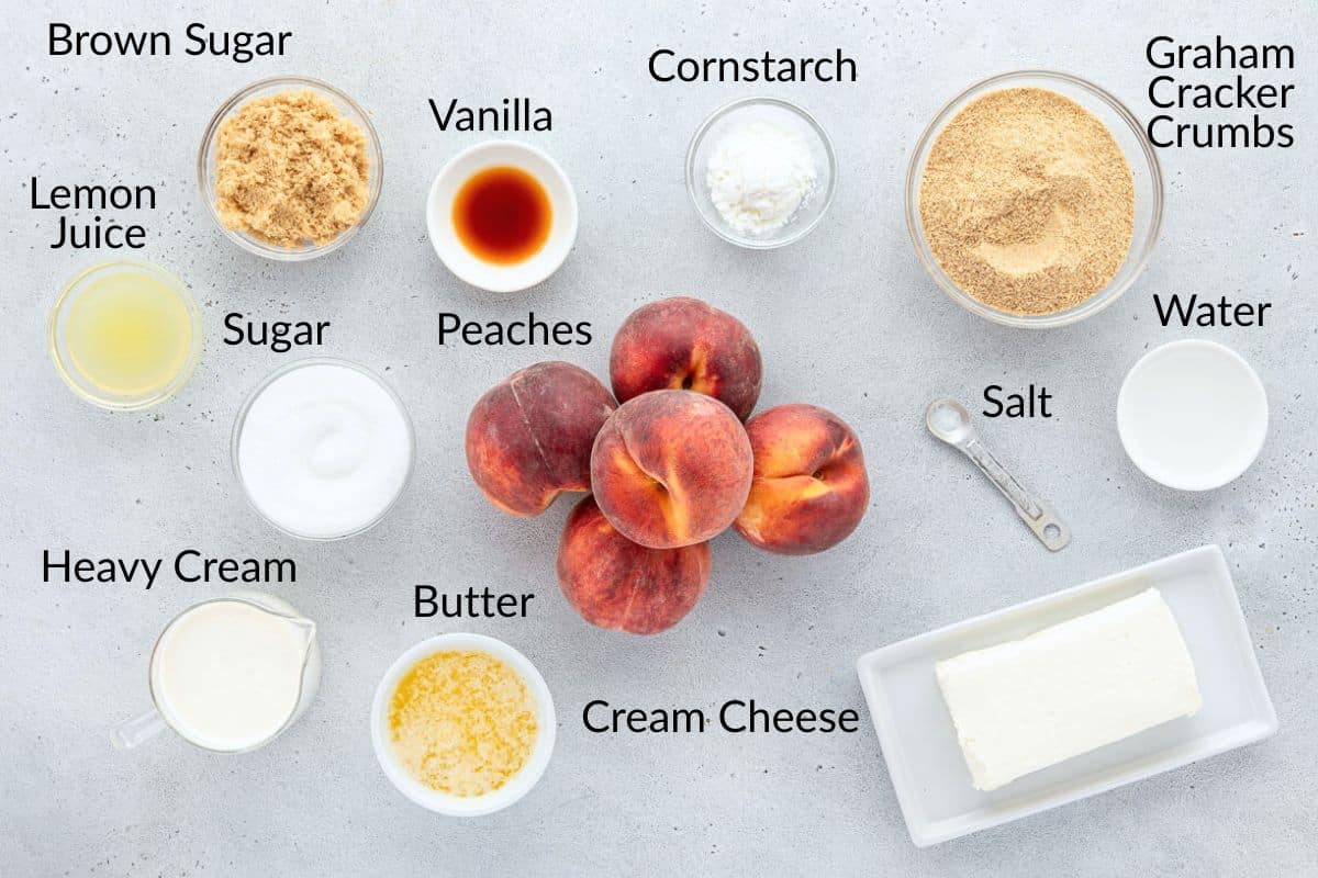 Ingredients for pie laid out, including peaches, cream cheese, sugar, butter, and more, labeled.