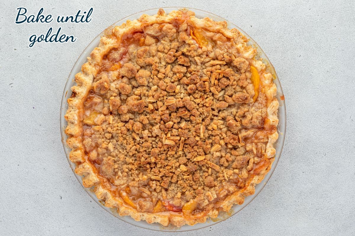 A golden baked crumble pie in a glass dish with the text "Bake until golden" in the corner.