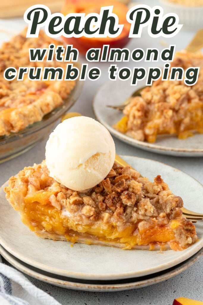 A slice of peach pie with almond crumble topping and a scoop of vanilla ice cream on a plate.