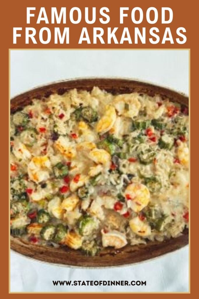 An oval dish filled with baked rice, shrimp, okra, and peppers, labeled "Famous Food from Arkansas.