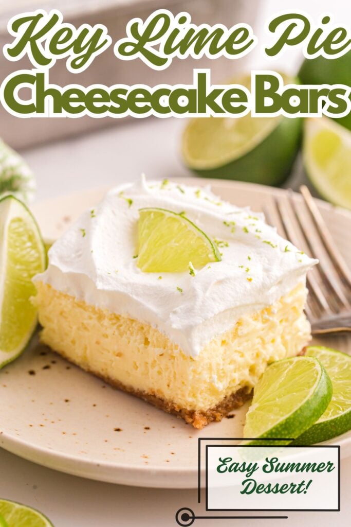 A slice of key lime pie cheesecake bar topped with whipped cream and lime, surrounded by lime wedges.