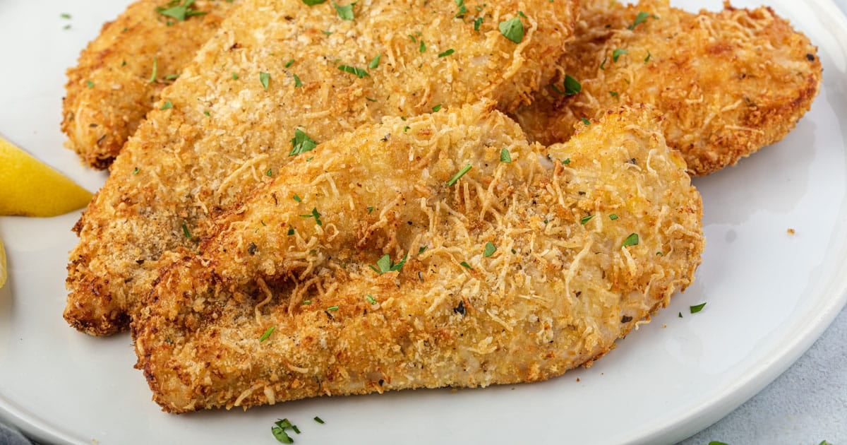 A close up shot of chicken cutlets.