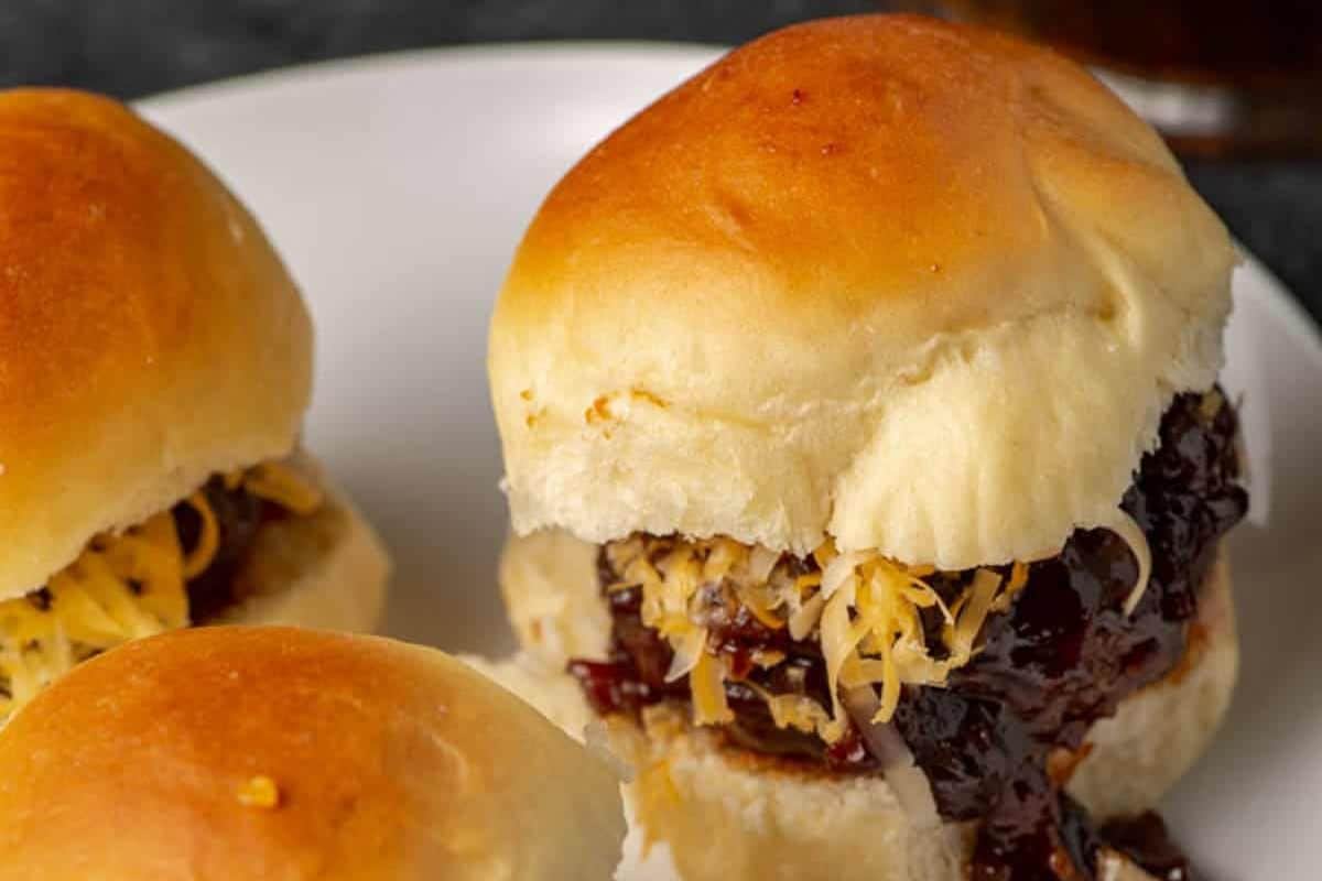 A close up shot of bourbon BBQ hamburger sliders.