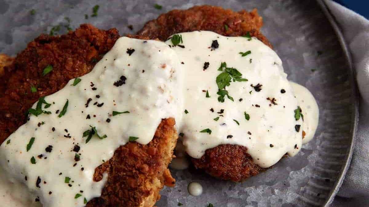 A close up shot of chicken fried steak.