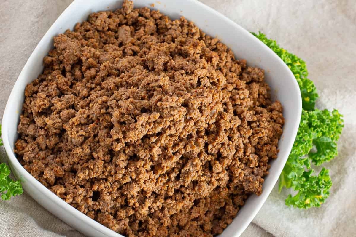A close up shot of ground beef taco meat.