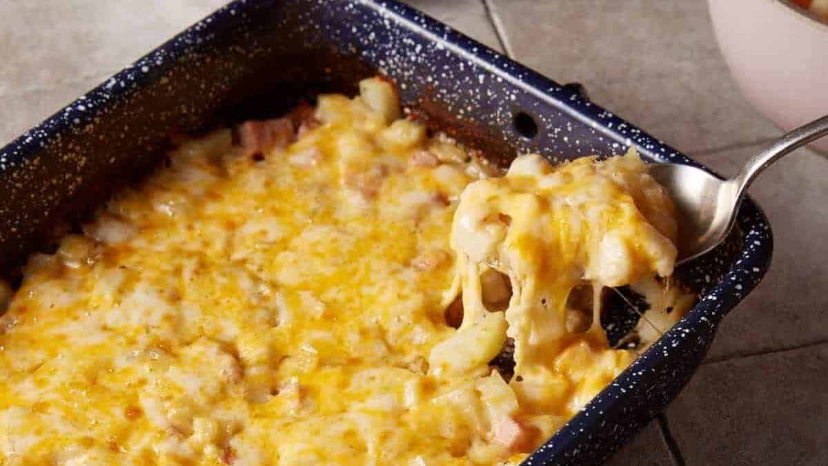A close up shot of ham and potato casserole.