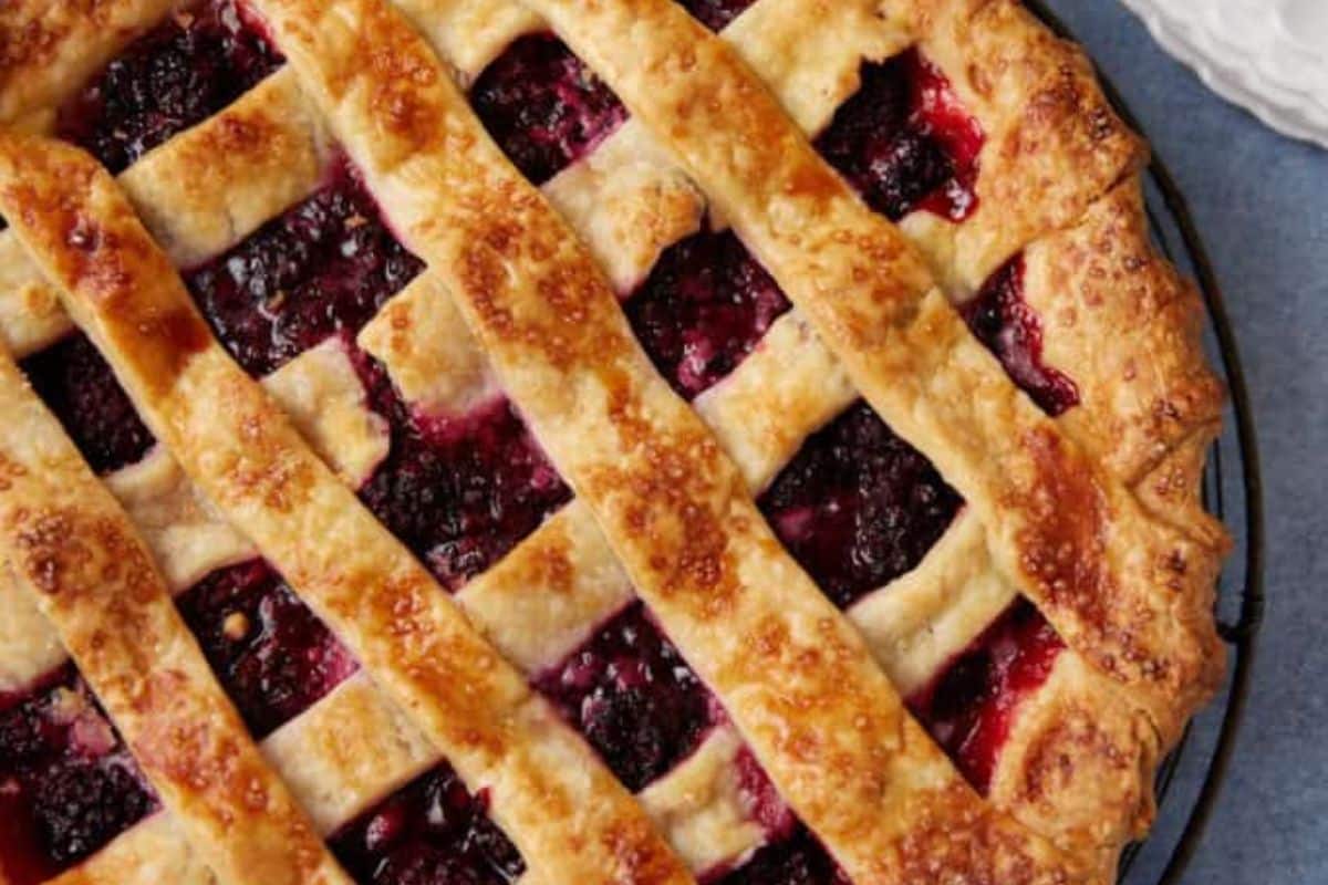 A close up shot of blackberry pie.