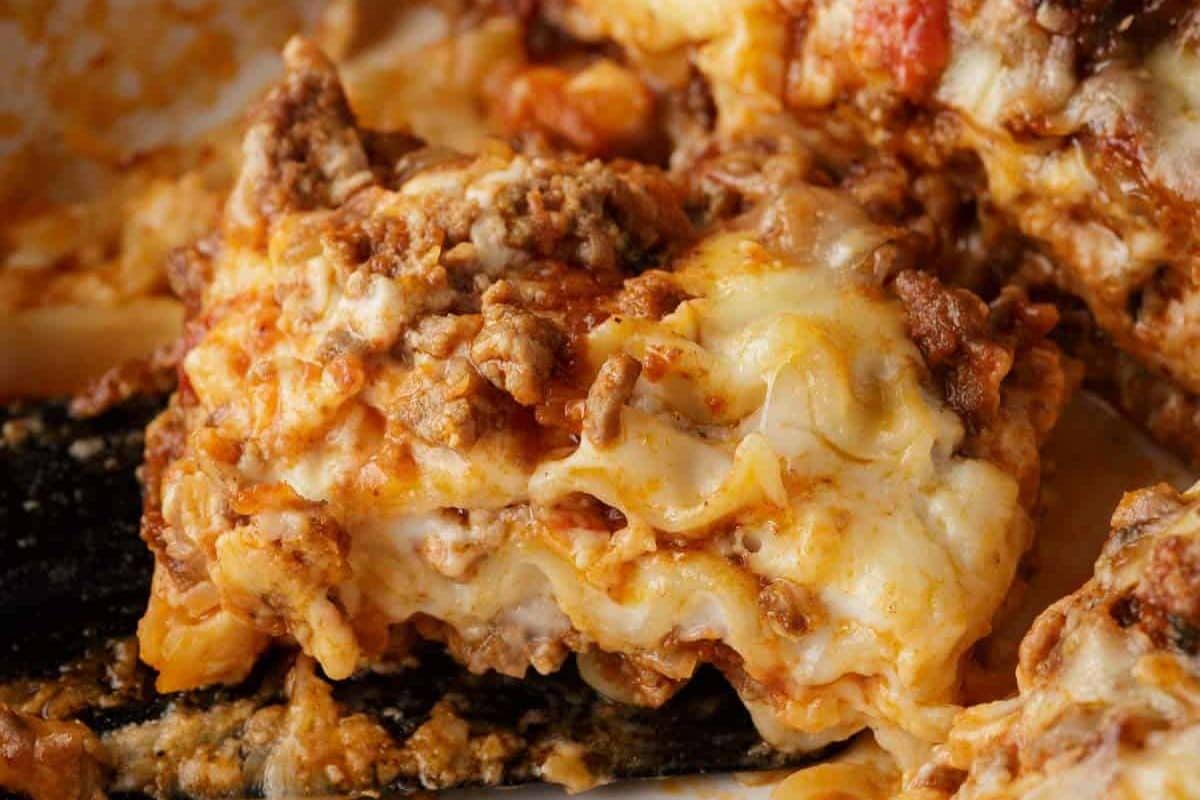 A close up shot of lasagna with bechamel sauce.
