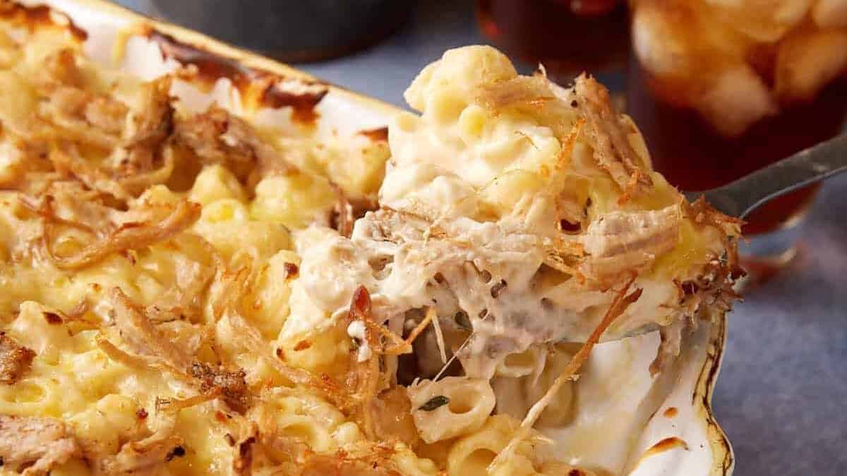 A close up shot of pulled pork mac and cheese.