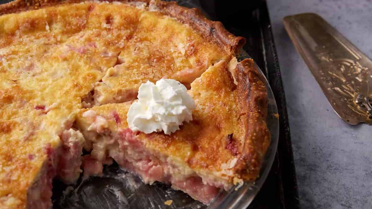 Close up shot of rhubarb custard pie.
