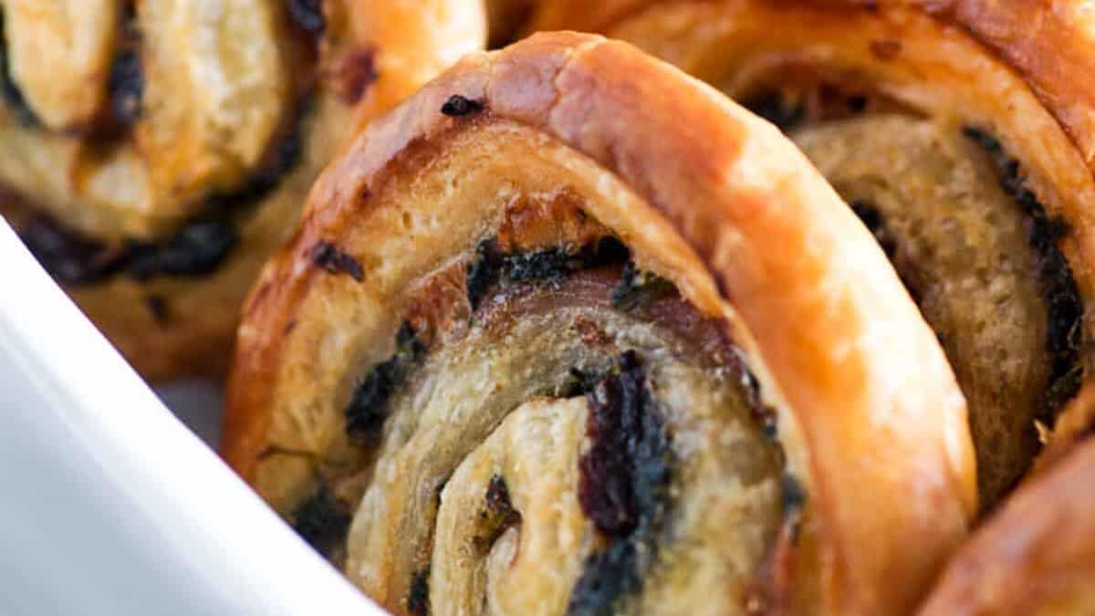 A close up shot of spinach pinwheels.