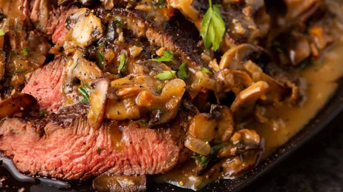 A close up shot of steak marsala.