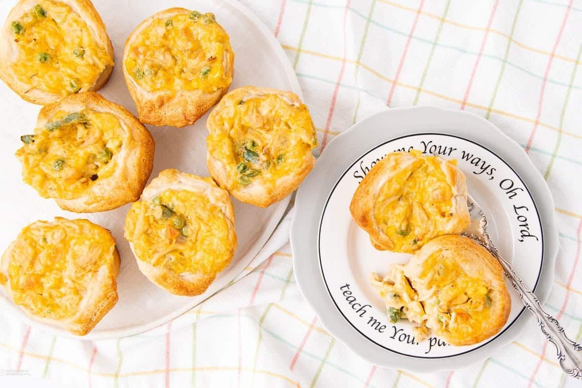 A close up shot of chicken mini pot pies.