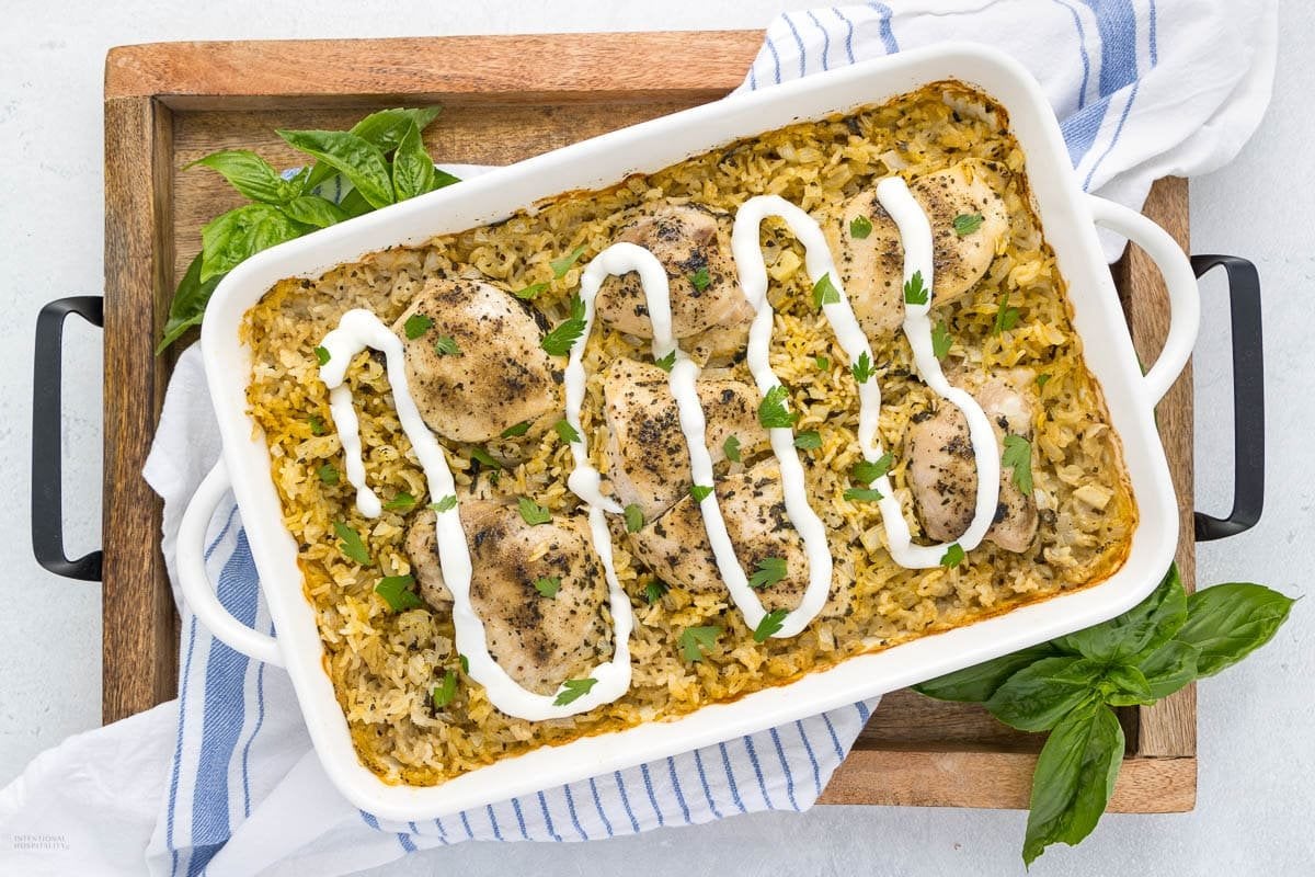 A close up shot of chicken over rice casserole.