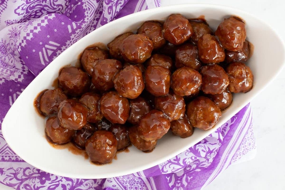 A close up shot of jelly meatballs.