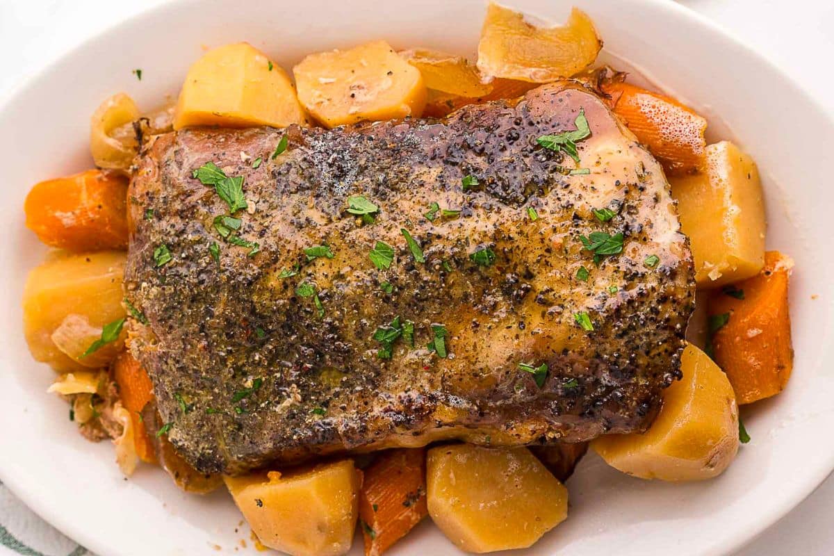 A close up shot of Pork Roast with Vegetables.