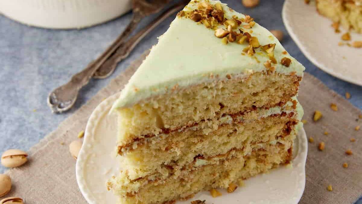 A close up shot of Watergate Cake with Pistachio Pudding and Cream Cheese Frosting.